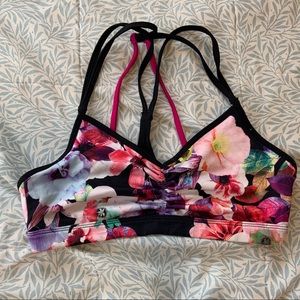 Pink and black floral sports bra